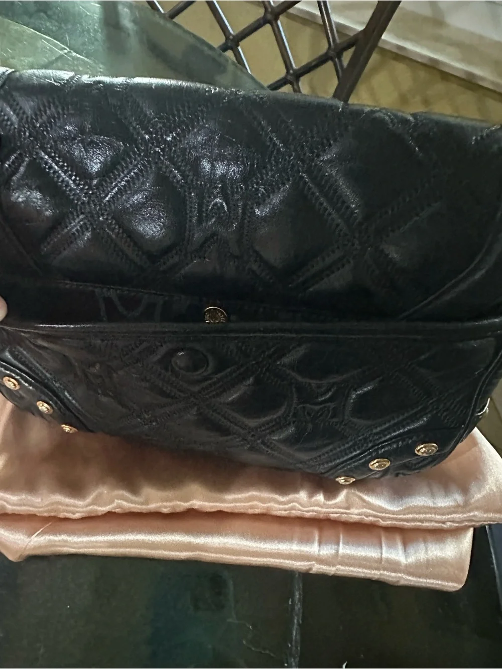 Metrocity Black Quilted Leather Crossbody Bag with Gold Hardware